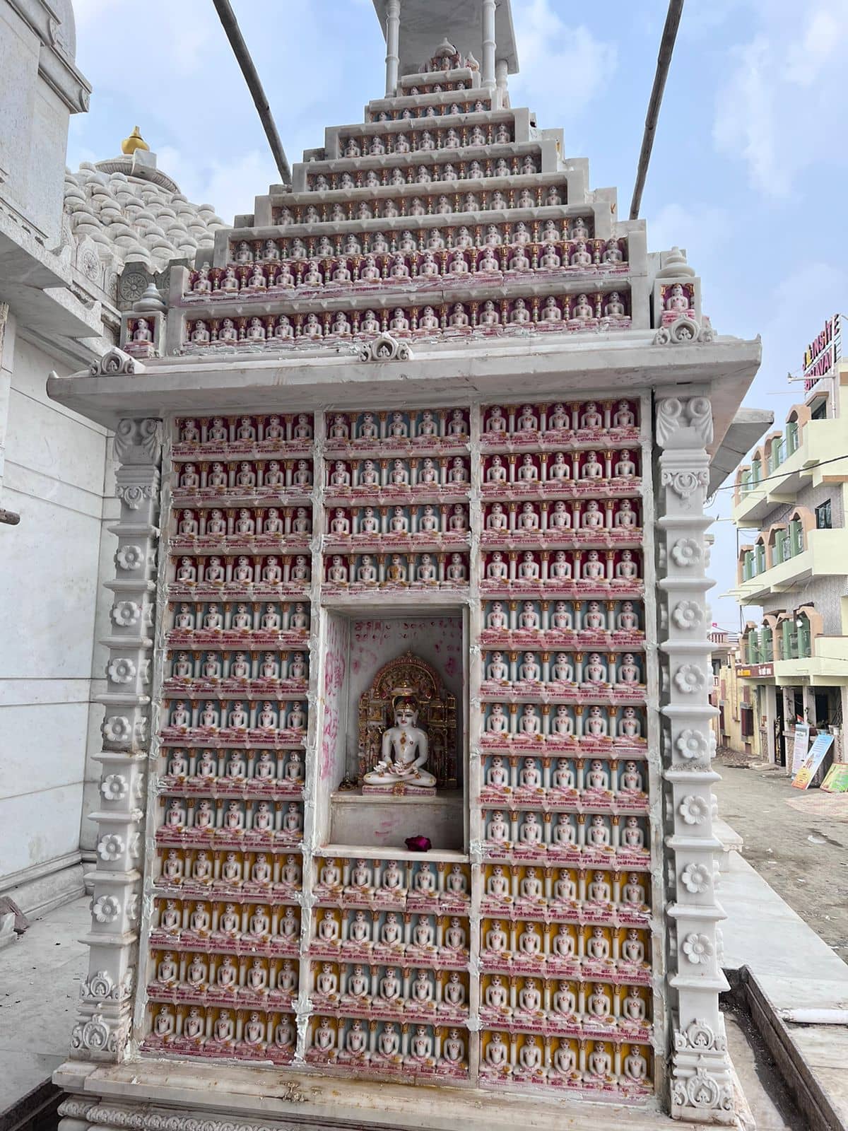 Sahastrakoot Jinalay at the Jainsite complex with the Jainsite Bhavan sign in the background